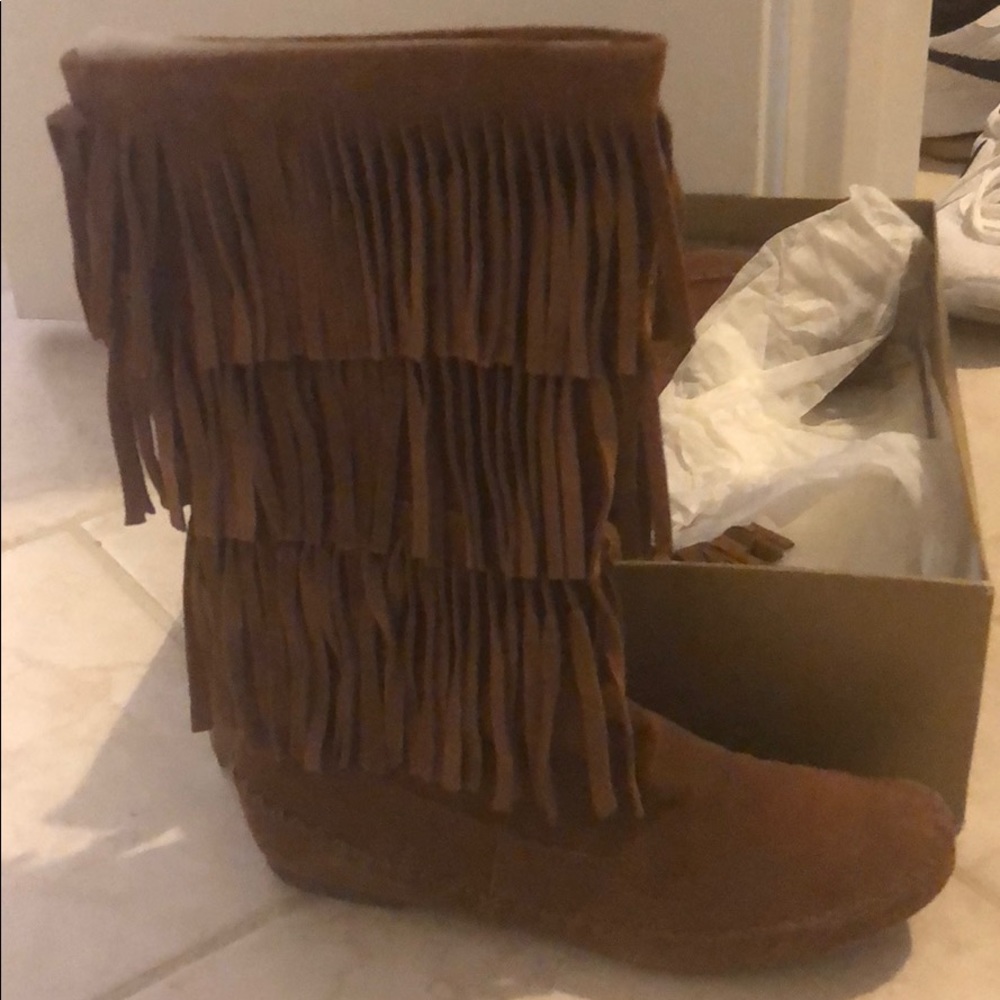 Lauren Conrad fringe boots.